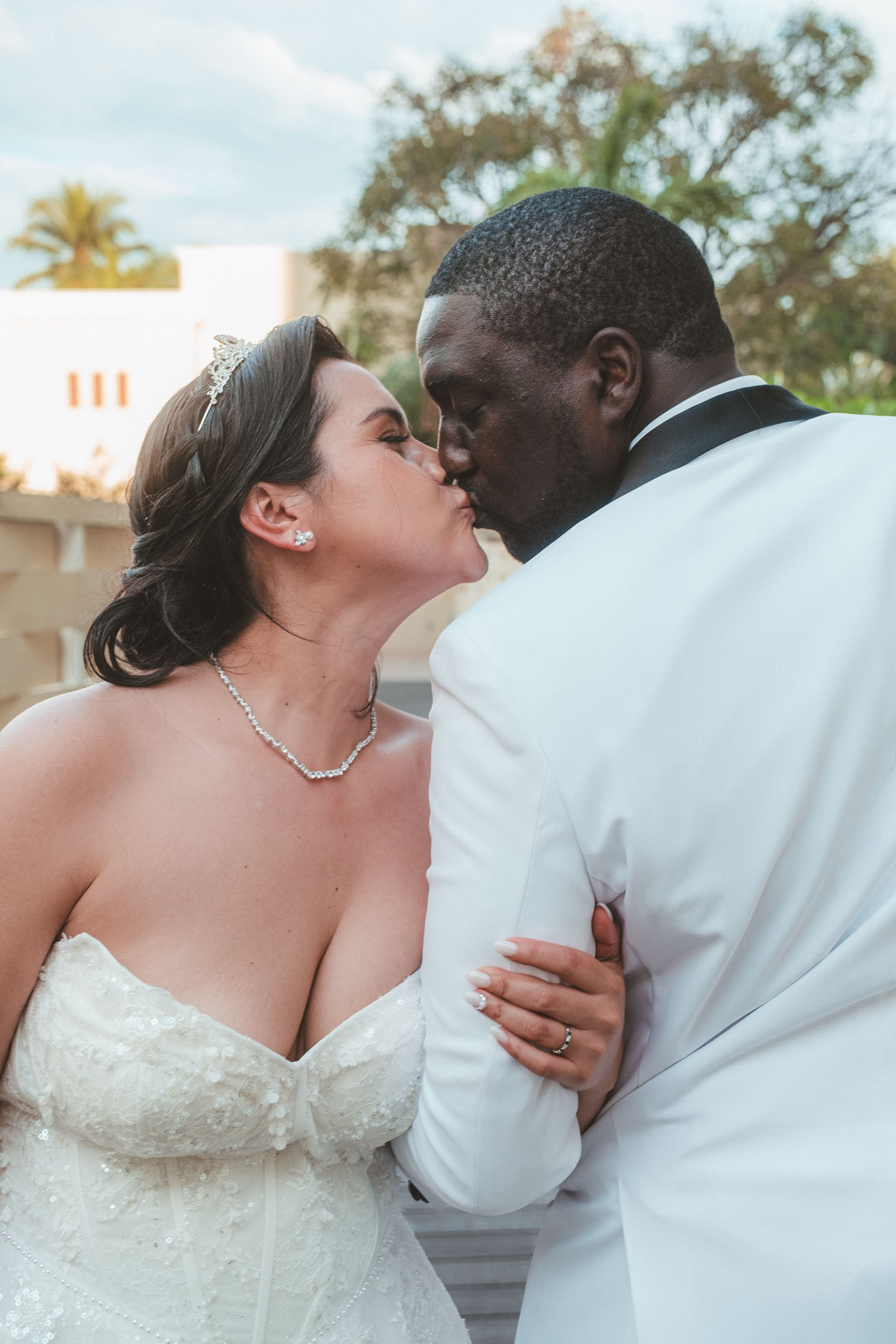 Bride and groom share a kiss at their Puerto Vallarta wedding